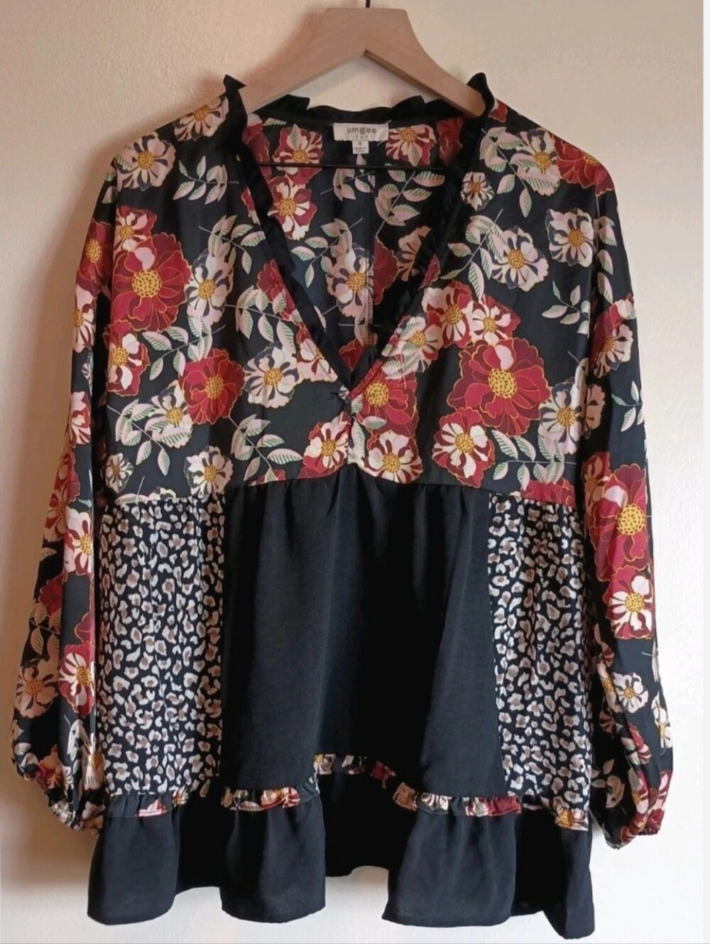 Umgee babydoll blouse features a bold, mixed design combining bohemian andanimal - Picture 10 of 10